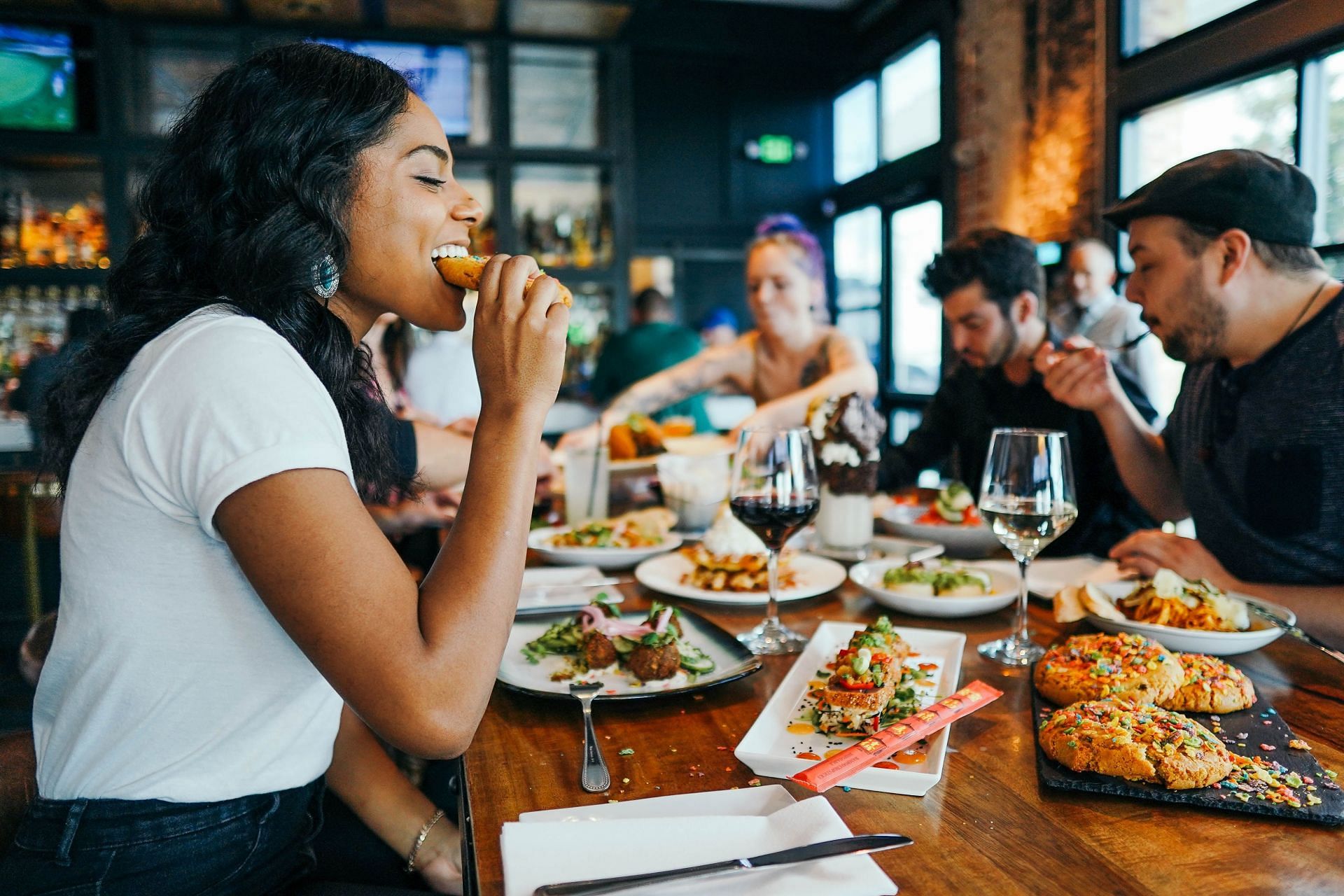 Eat slowly to avoid excessive burps. (Image via Unsplash/ Alex Haney)